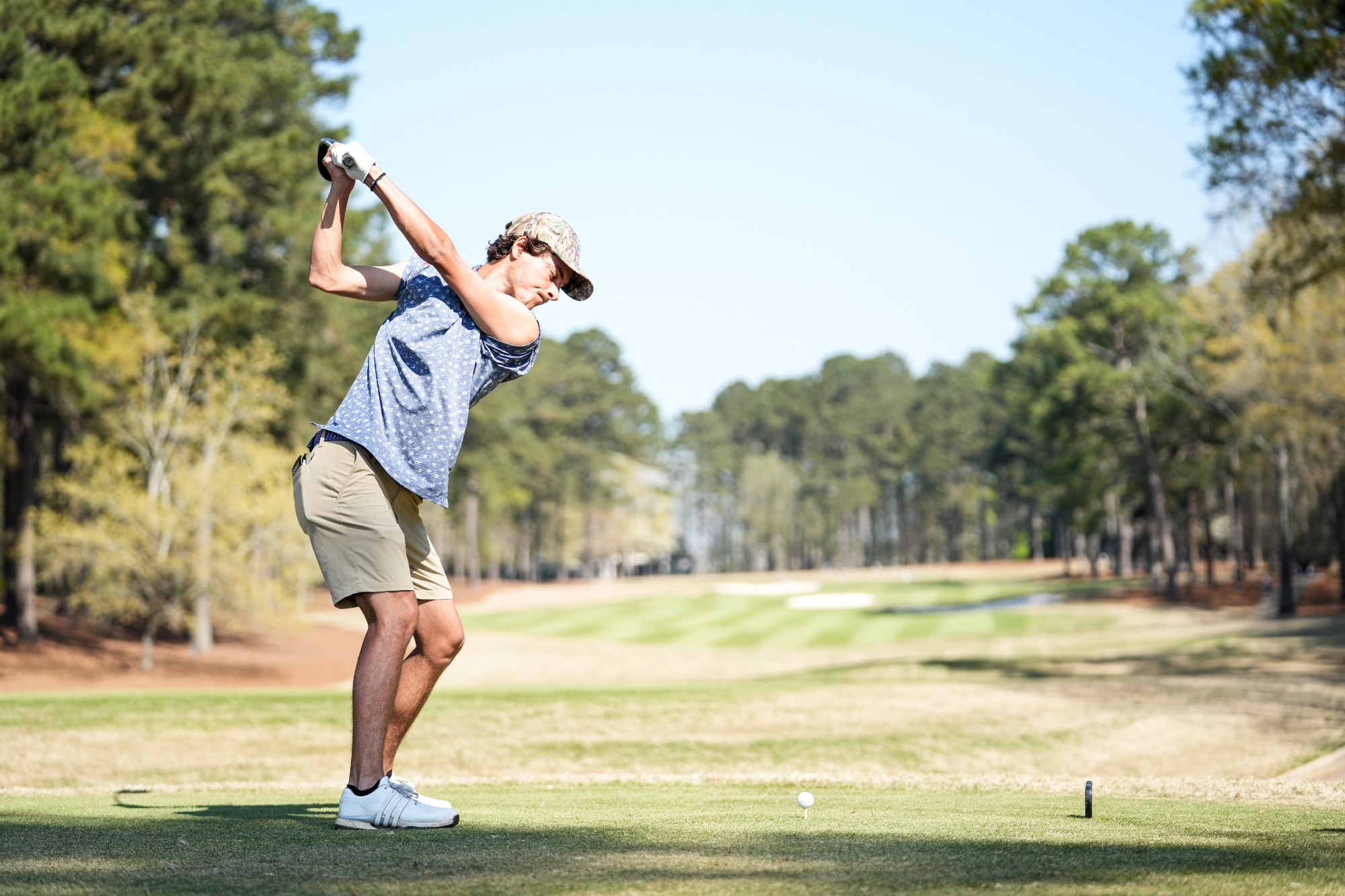 MGO at 2026 Linger Longer Invitational
UWG golfer swings club while wearing while polo and khaki shorts.