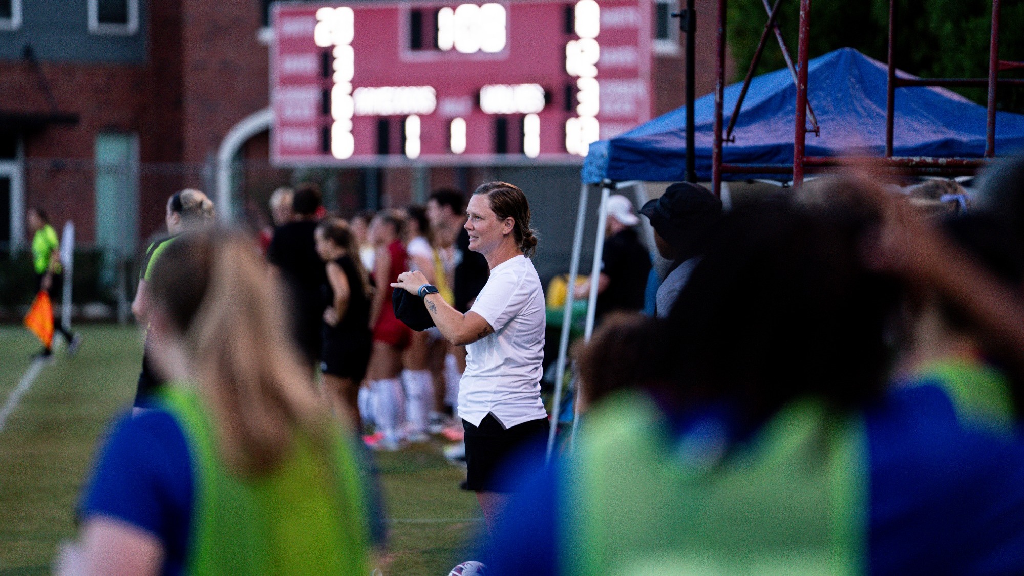Cinematic shot of Head Coach Mallory Sayre 