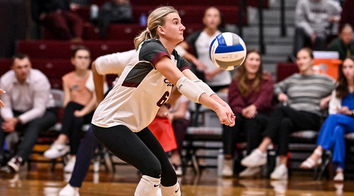Action photo of Megan Lund passing