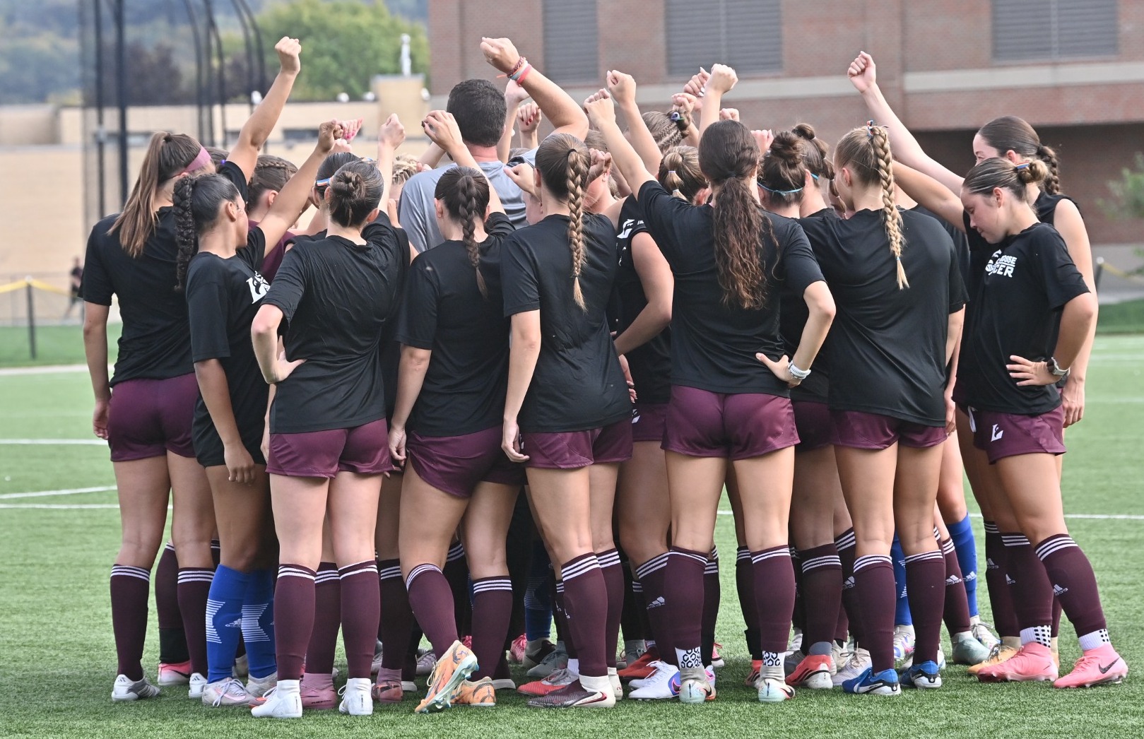 Soccer Team Huddle Photo
