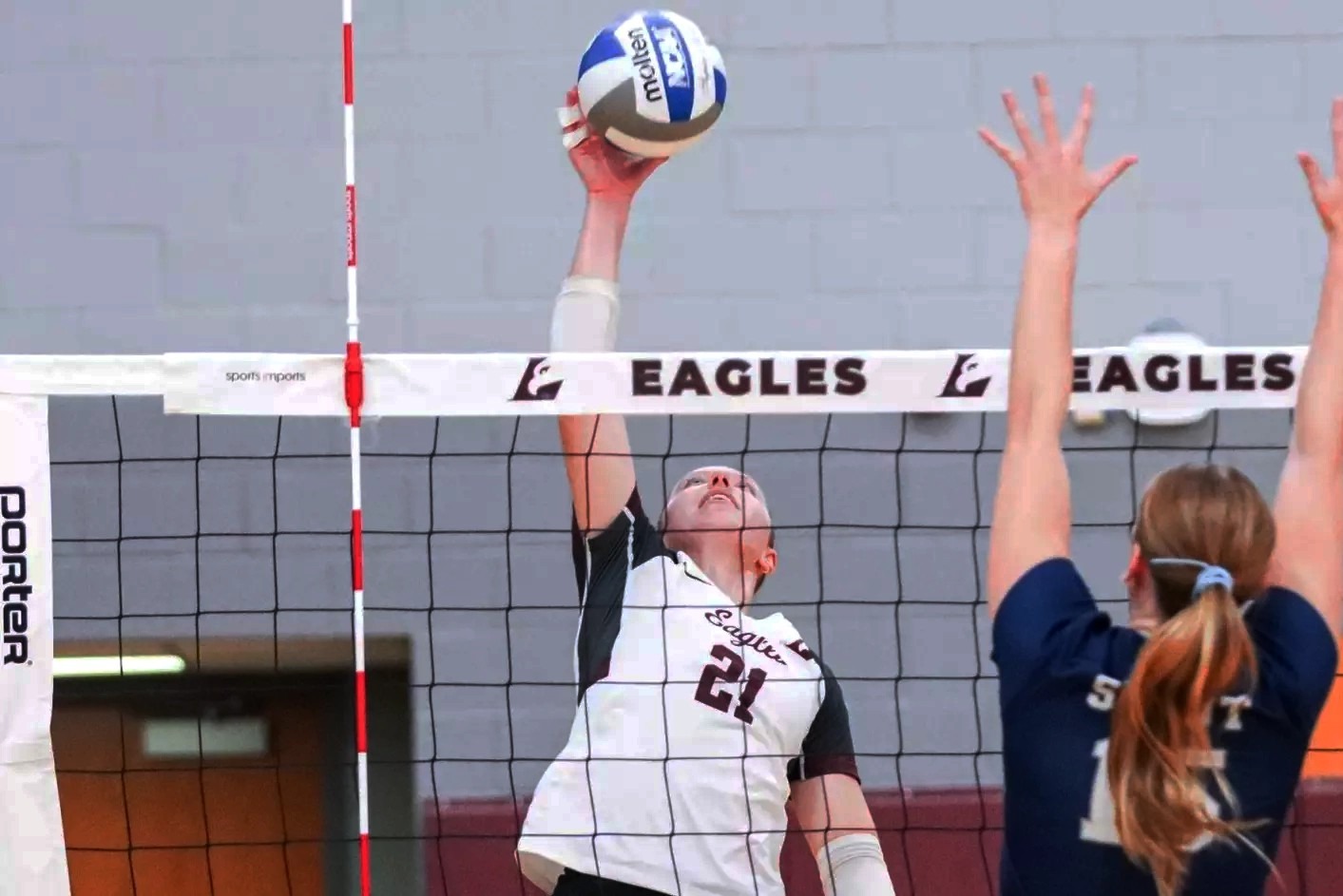 Action photo of Sydney Marx hitting