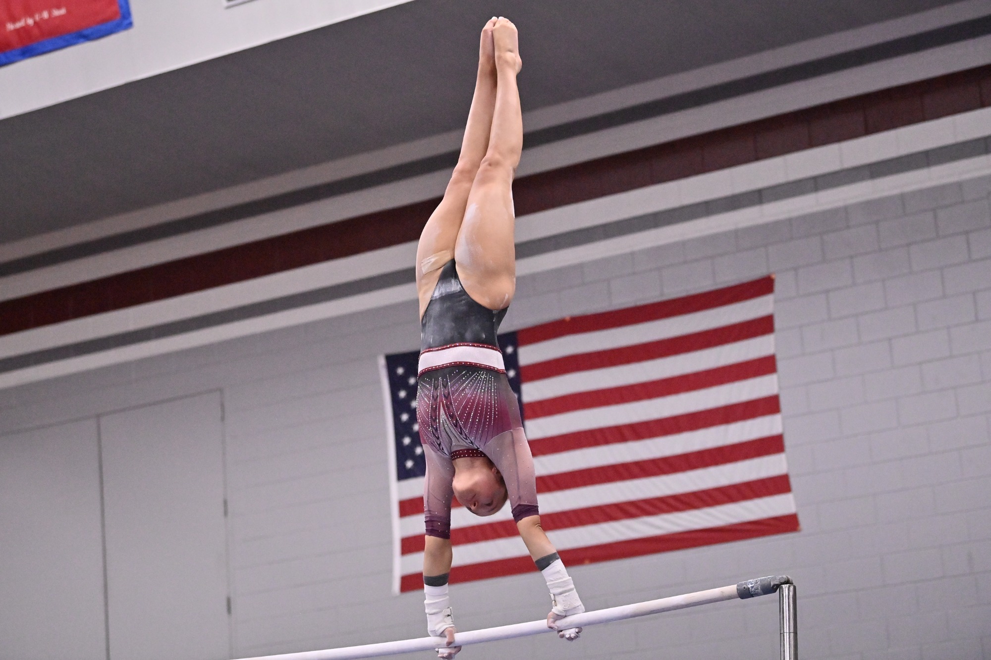 Action photo of Madalyn McCormick on bars