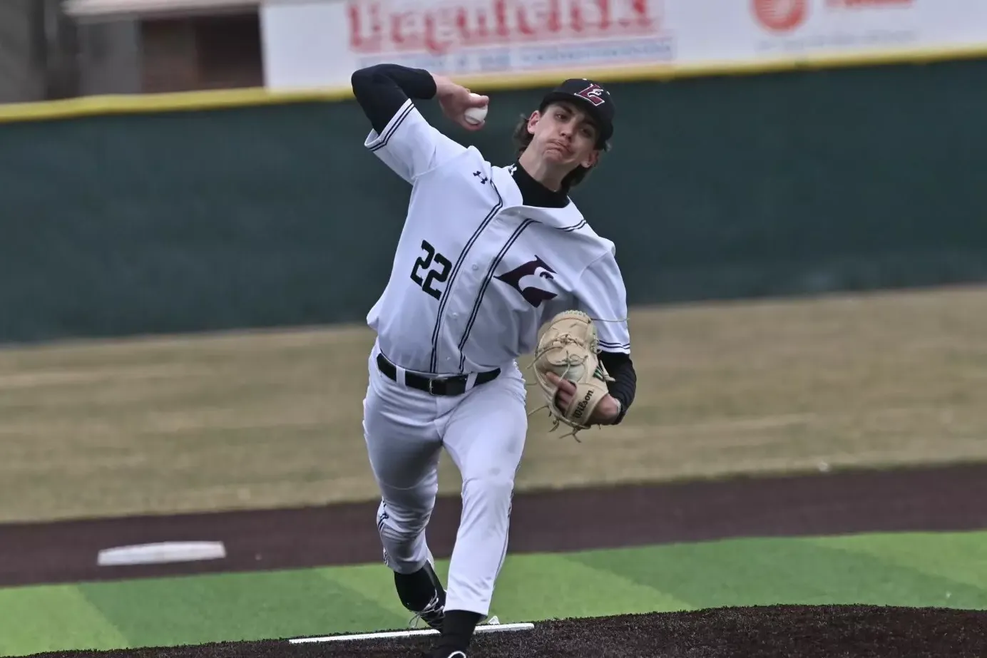 Logan Zickert throwing a pitch against UW-River Falls
