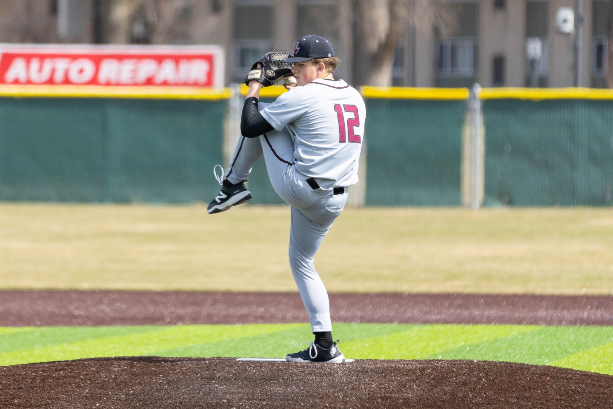 AJ Curtis throwing a pitch