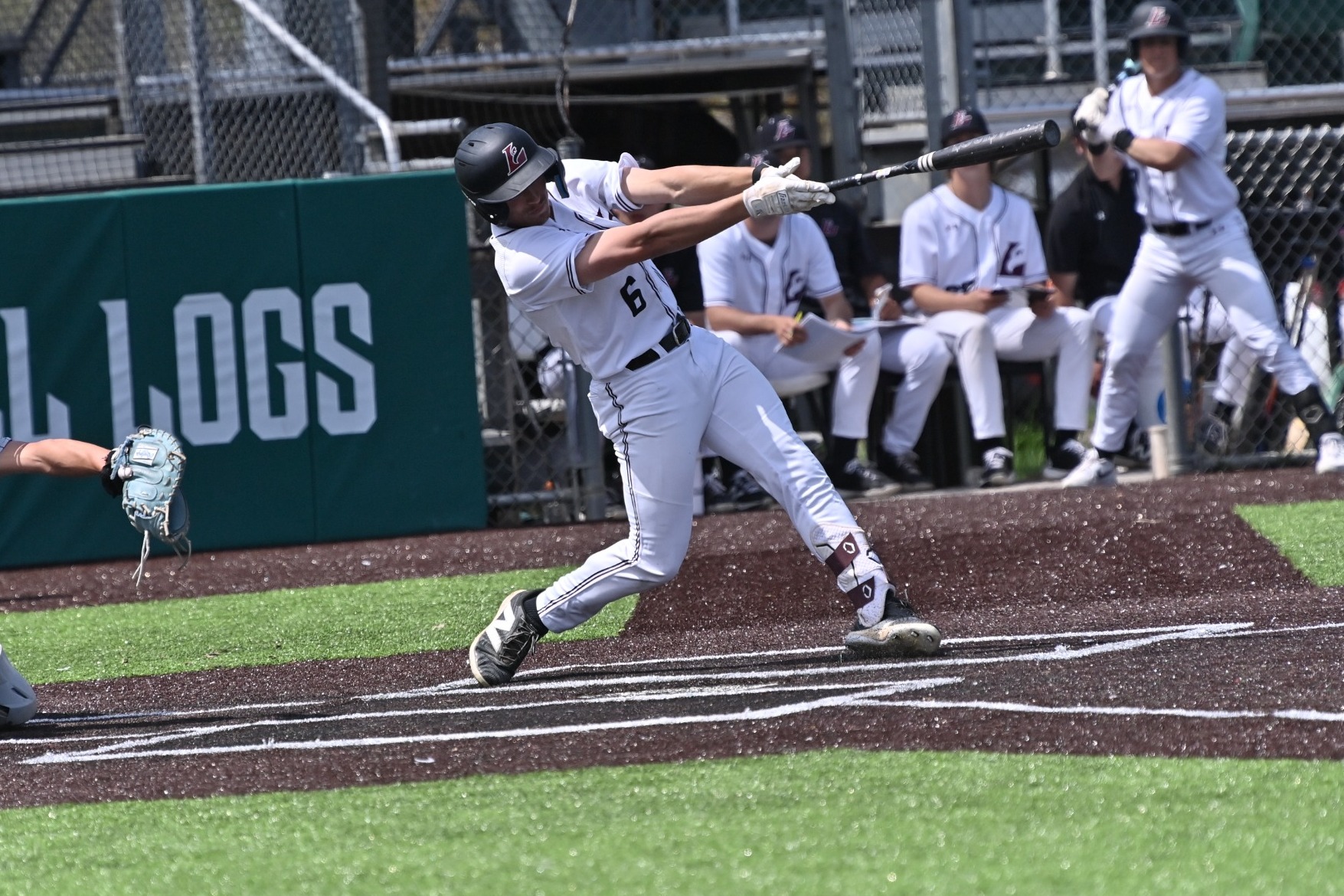 AJ Levy swings at a pitch 