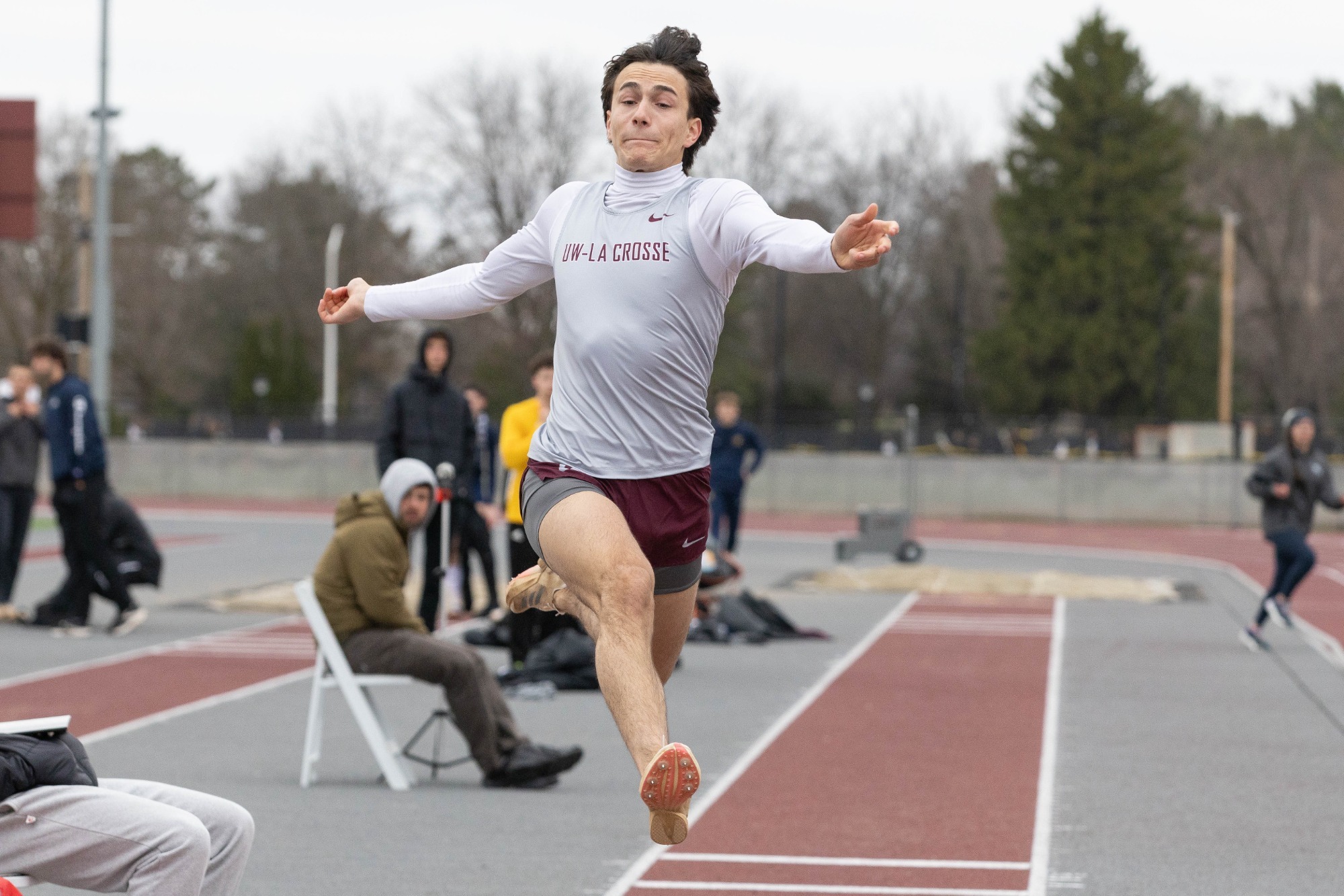 Long jump photo of Allen Stupinean at Ashton May Invite