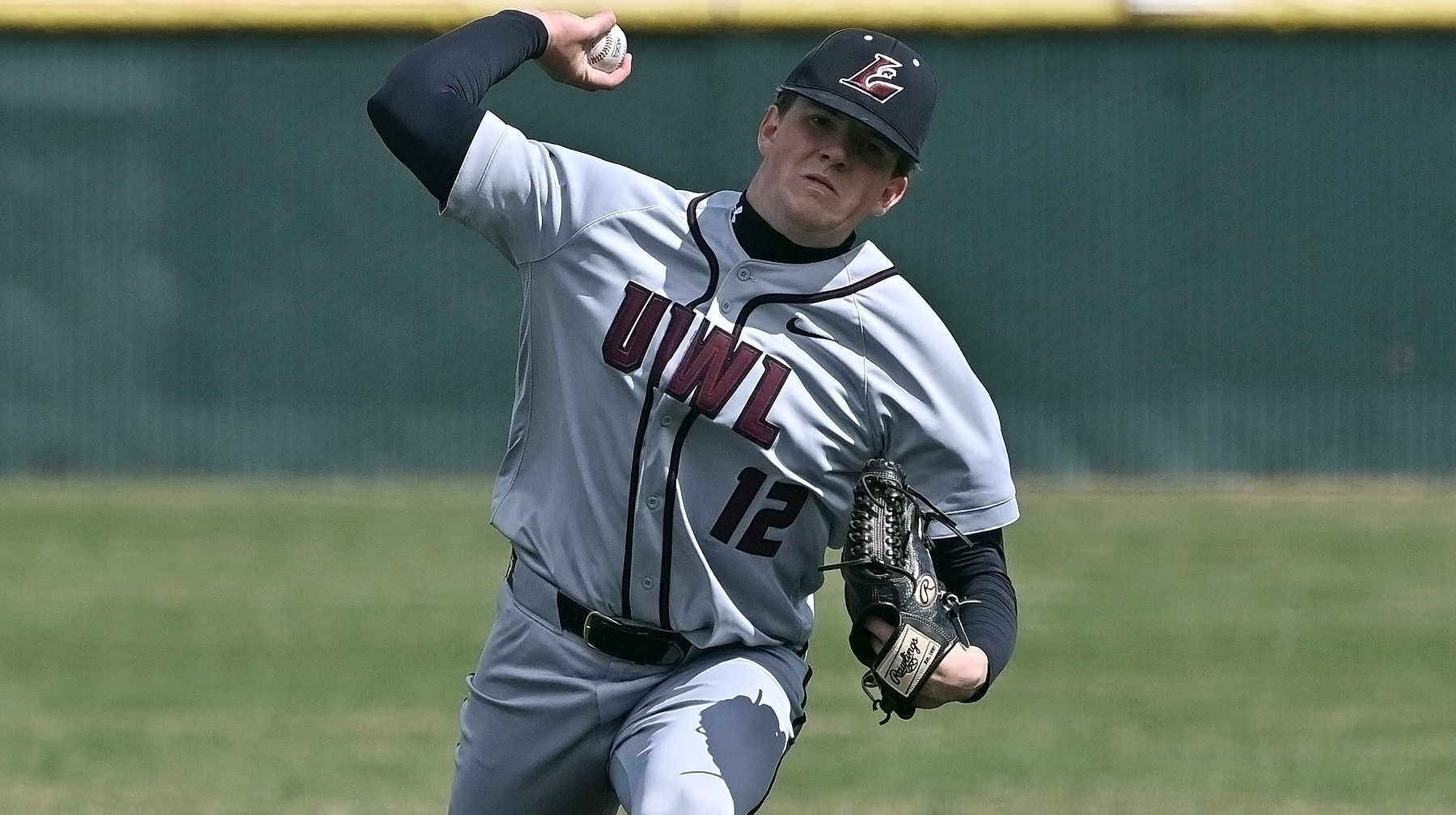 AJ Curtis throwing a pitch