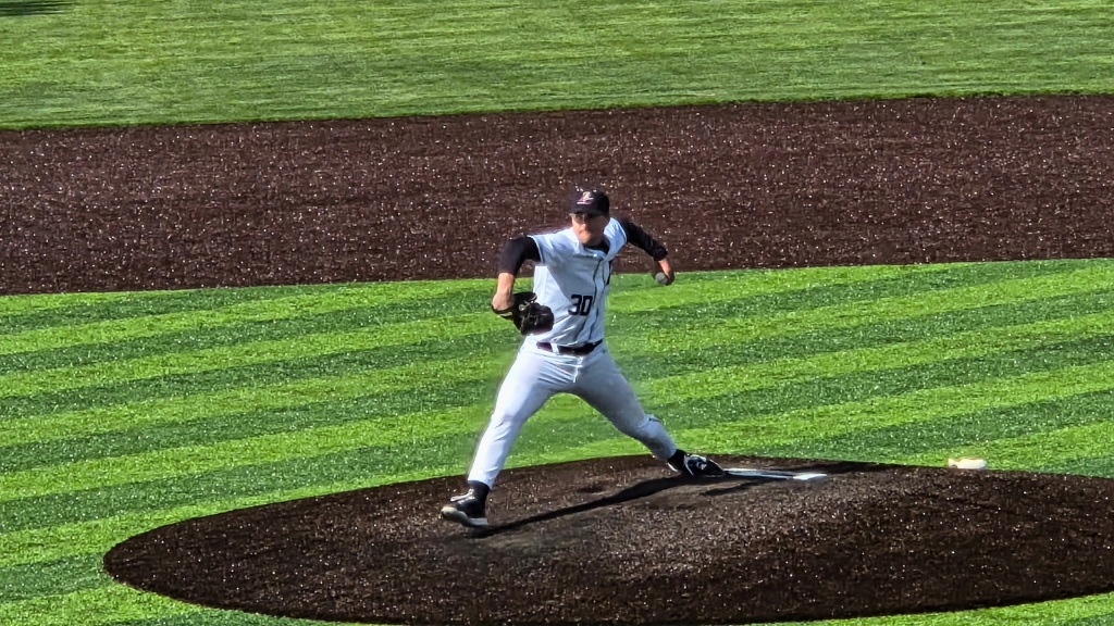 Owen Deprez throwing a pitch versus UW-Oshkosh