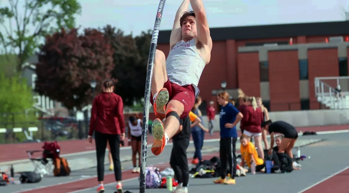 Action photo of Gaven Lange doing pole vault