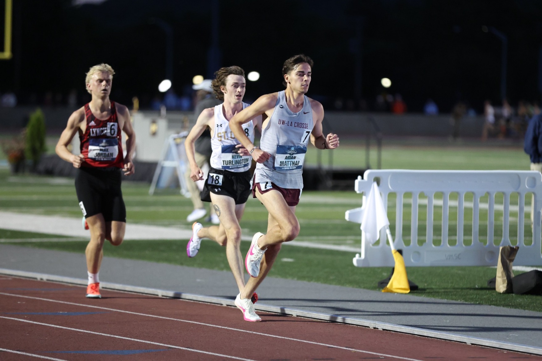 Action photo of Aidan Matthai running 10000 meter run