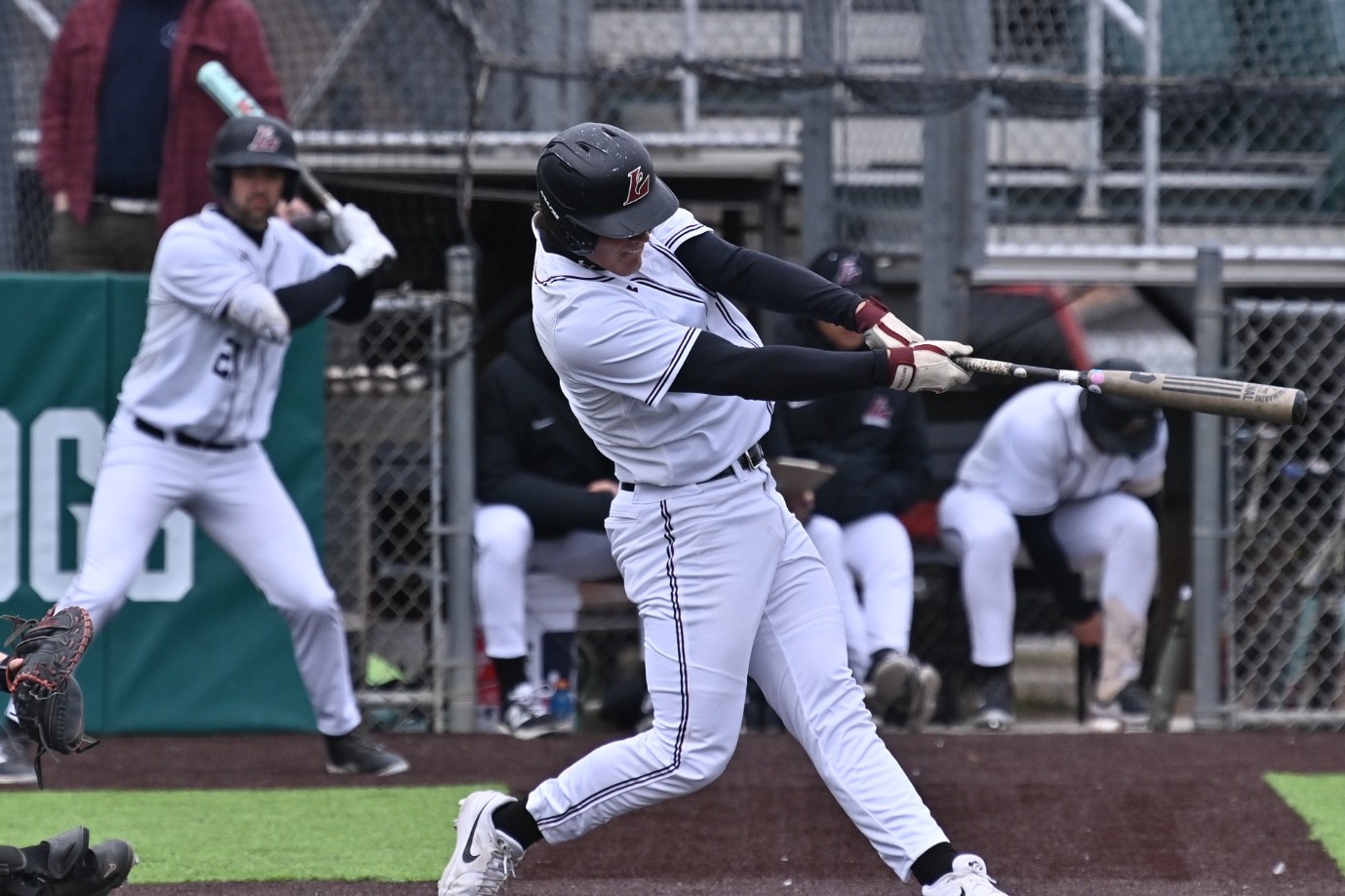 Andrew Palm swinging the bat