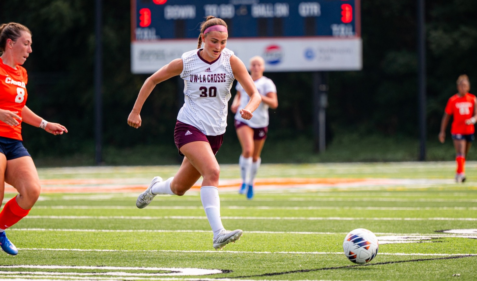 Macy Evans Dribbling Ball