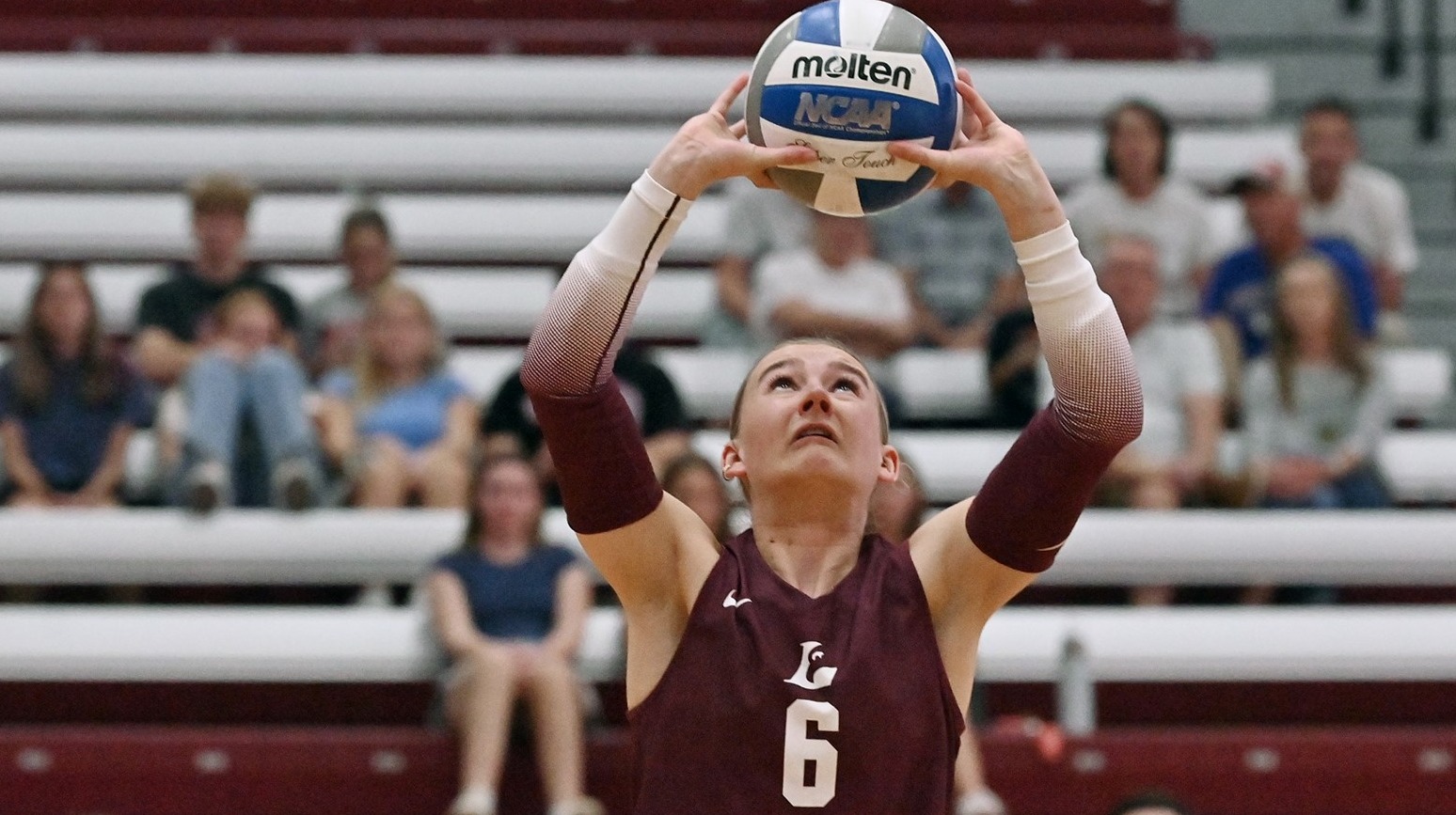 Action photo of Megan Lund setting