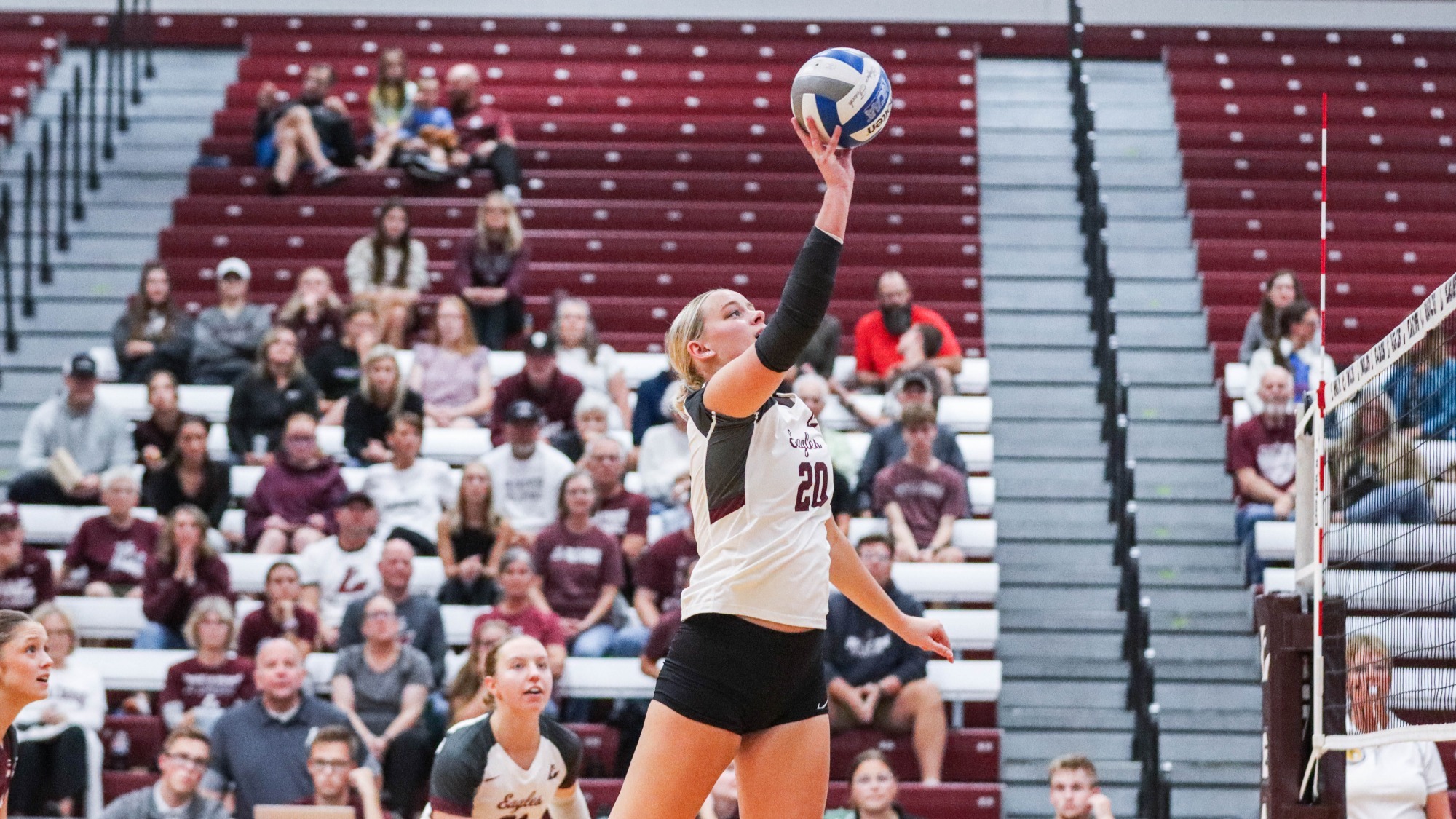 Action photo of Annie Werner hitting ball