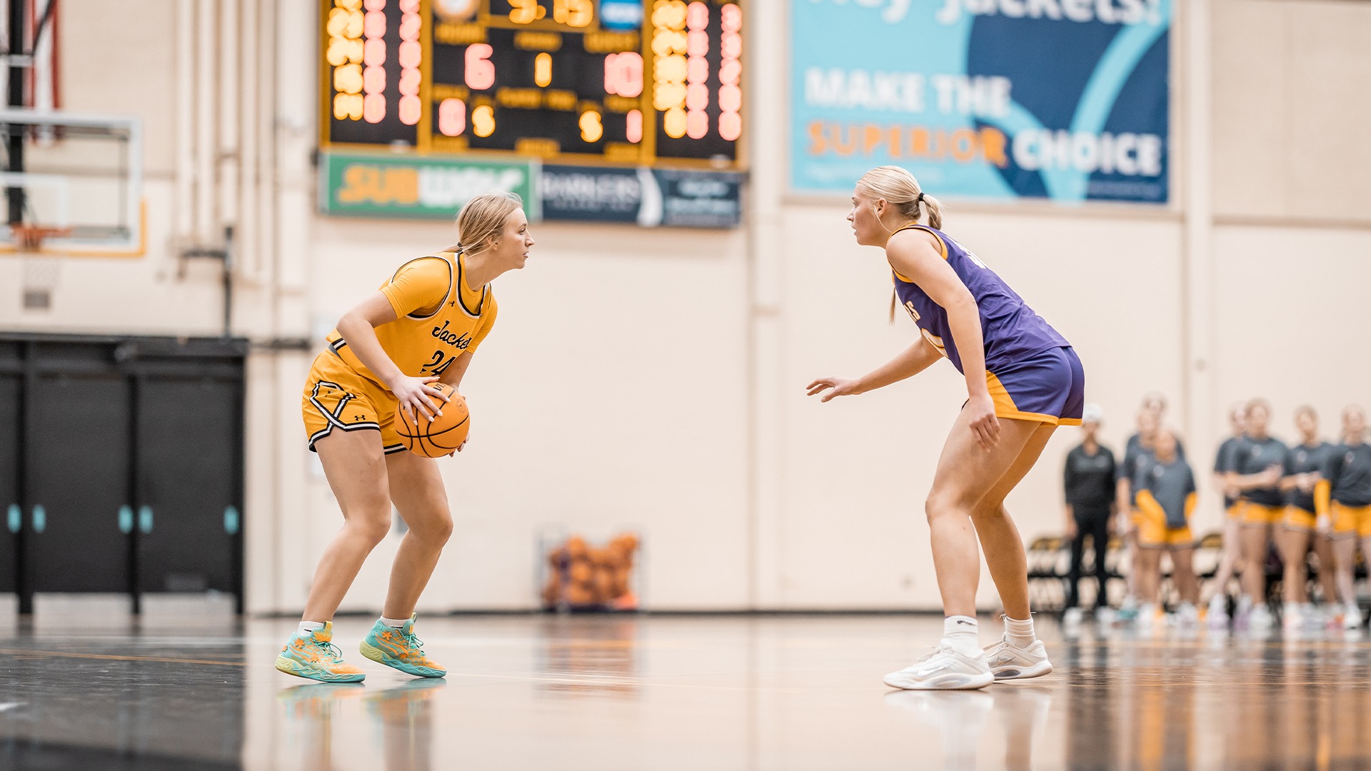 Hope Carlson across from a Stevens Point defender.