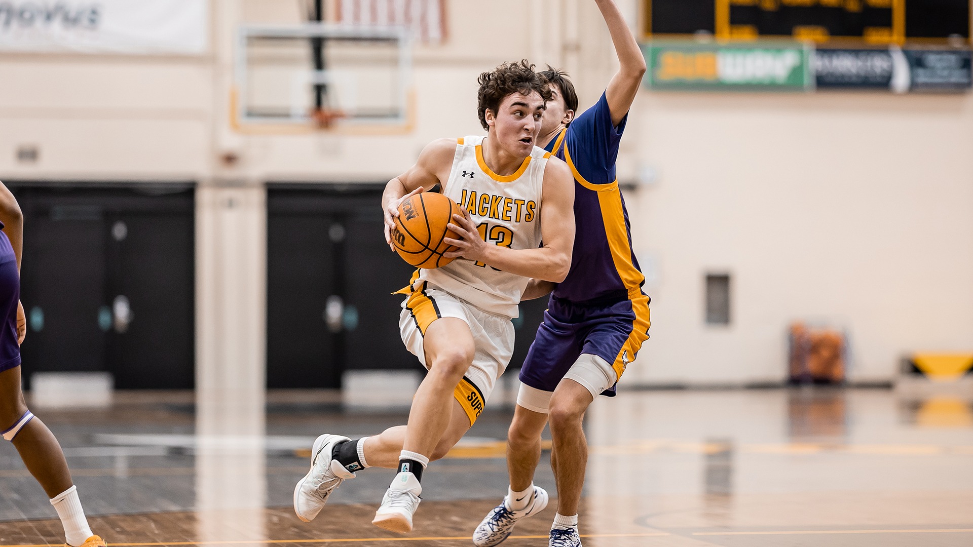 Gage Braiedy drives to the hoop against Northwestern.
