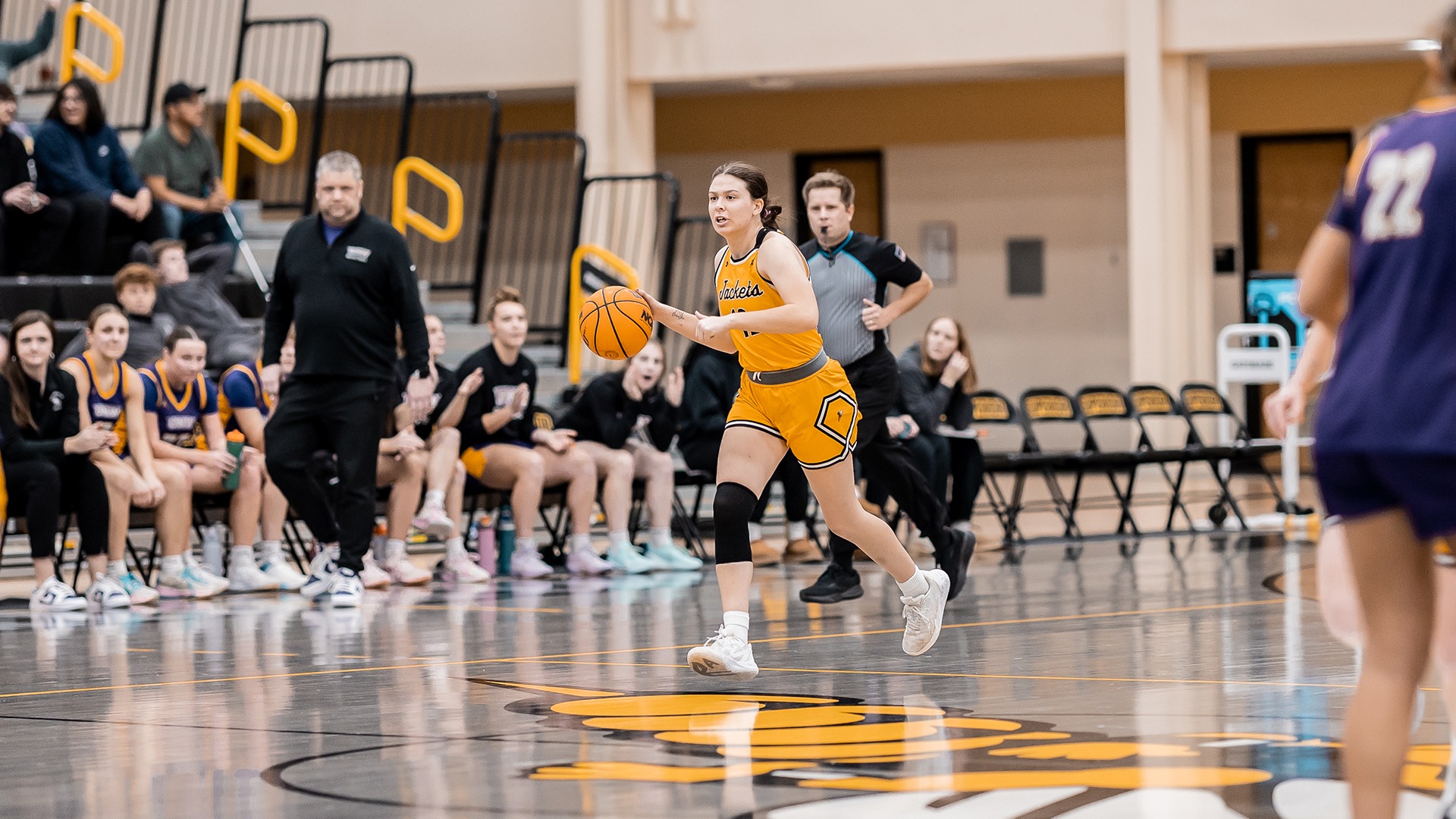 MyKenzie Leccia dribbles up the court against Northwestern. 