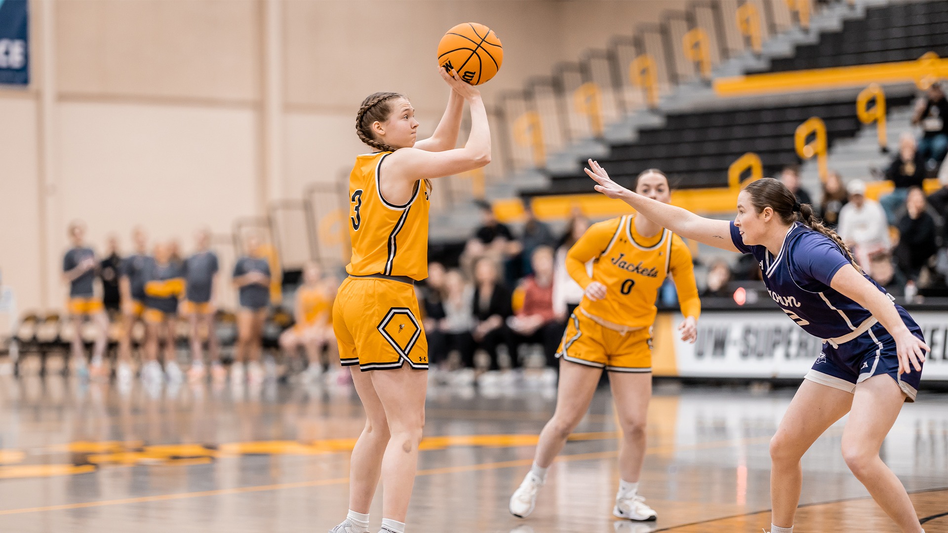 Maddie Reott shooting a jumper versus Crown.