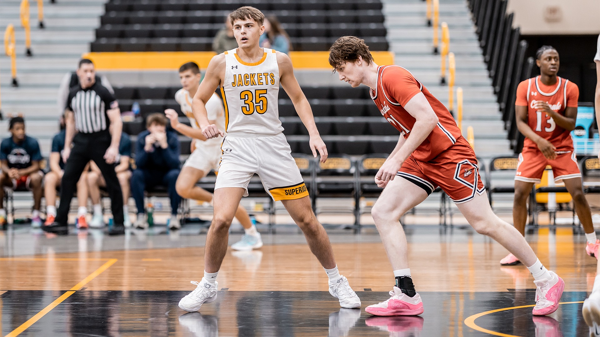 Landen Thomer next to a Saint Mary's defender.