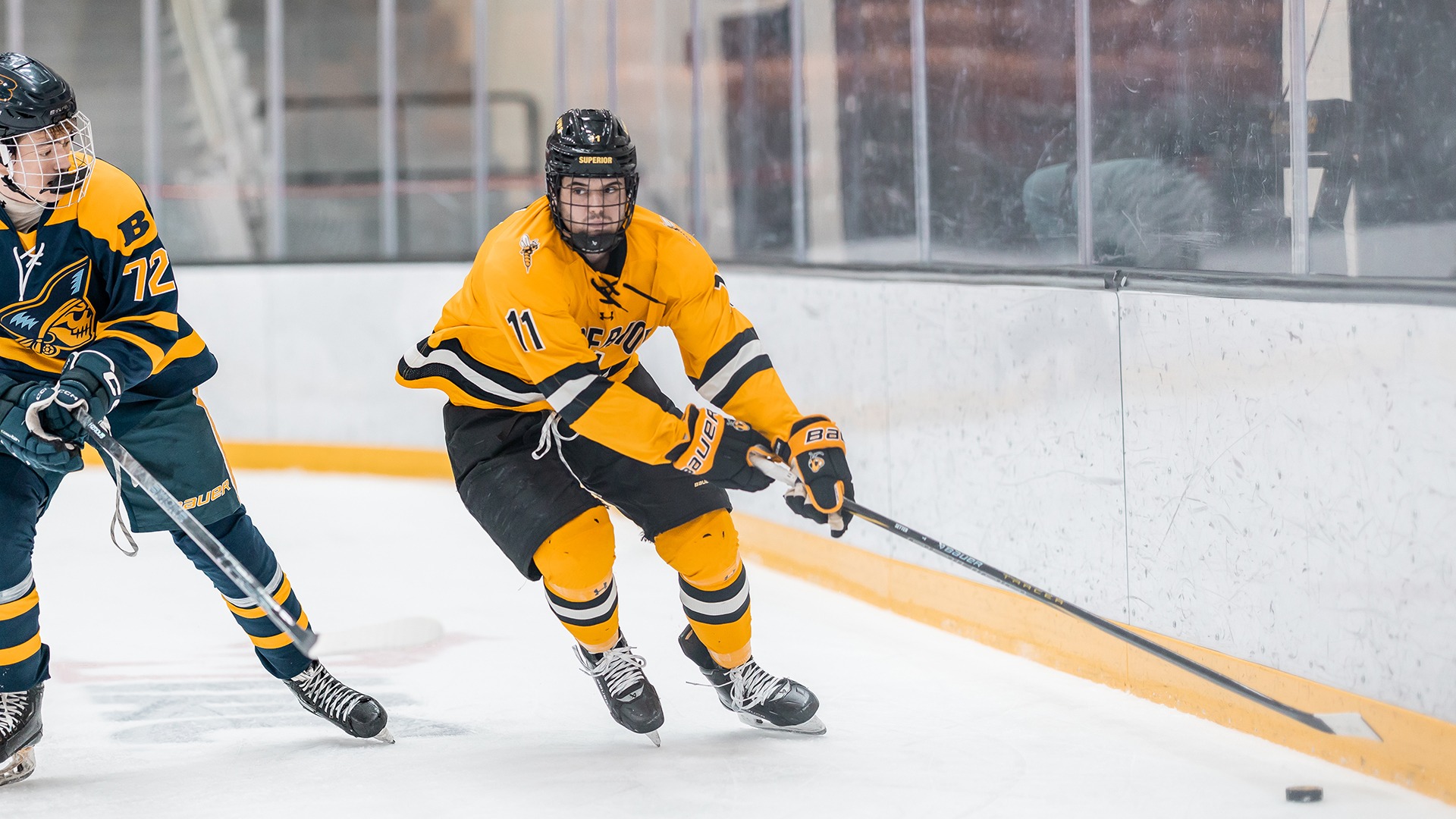 Blake Setter skates with puck against Beloit.