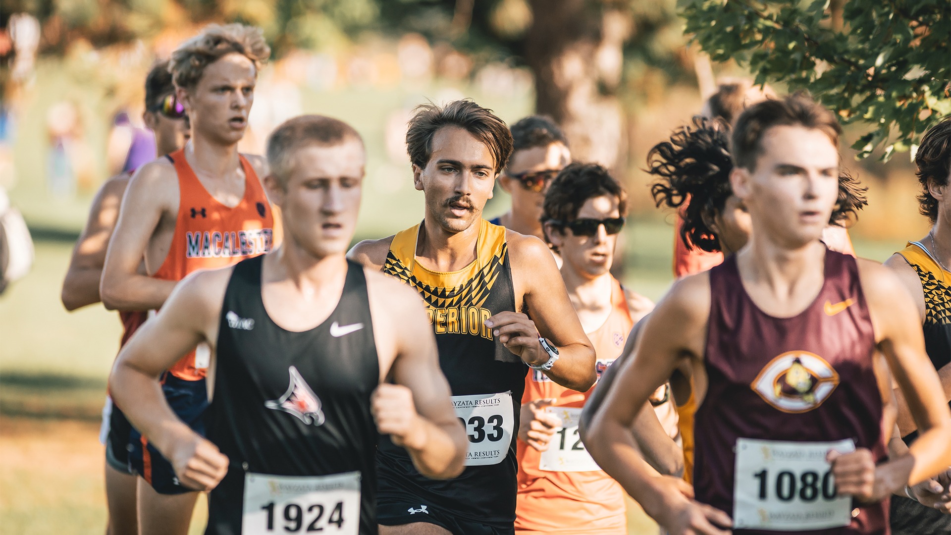 Dominick Meisner in a cross country race surrounded by his competitors.