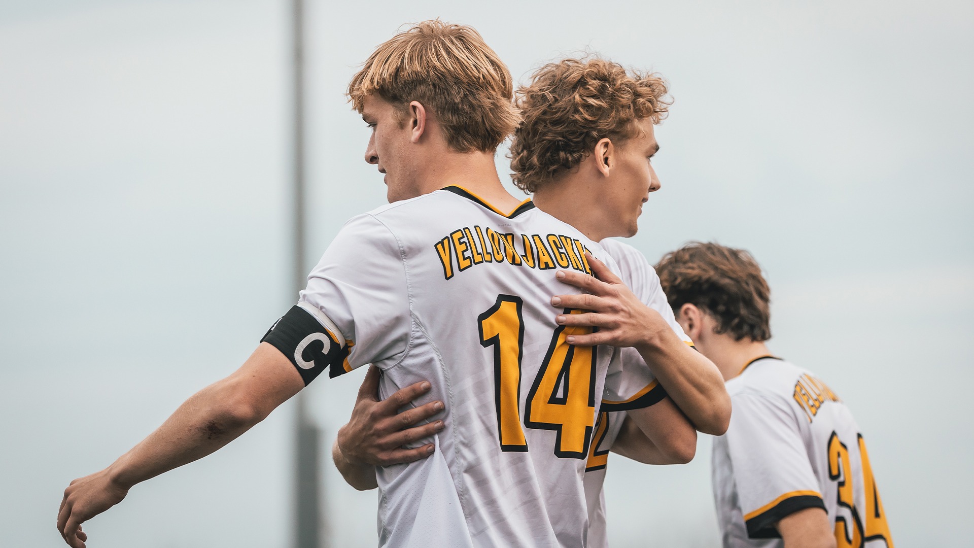 Seth Davidson celebrating a goal with teammate Callum Greenan.