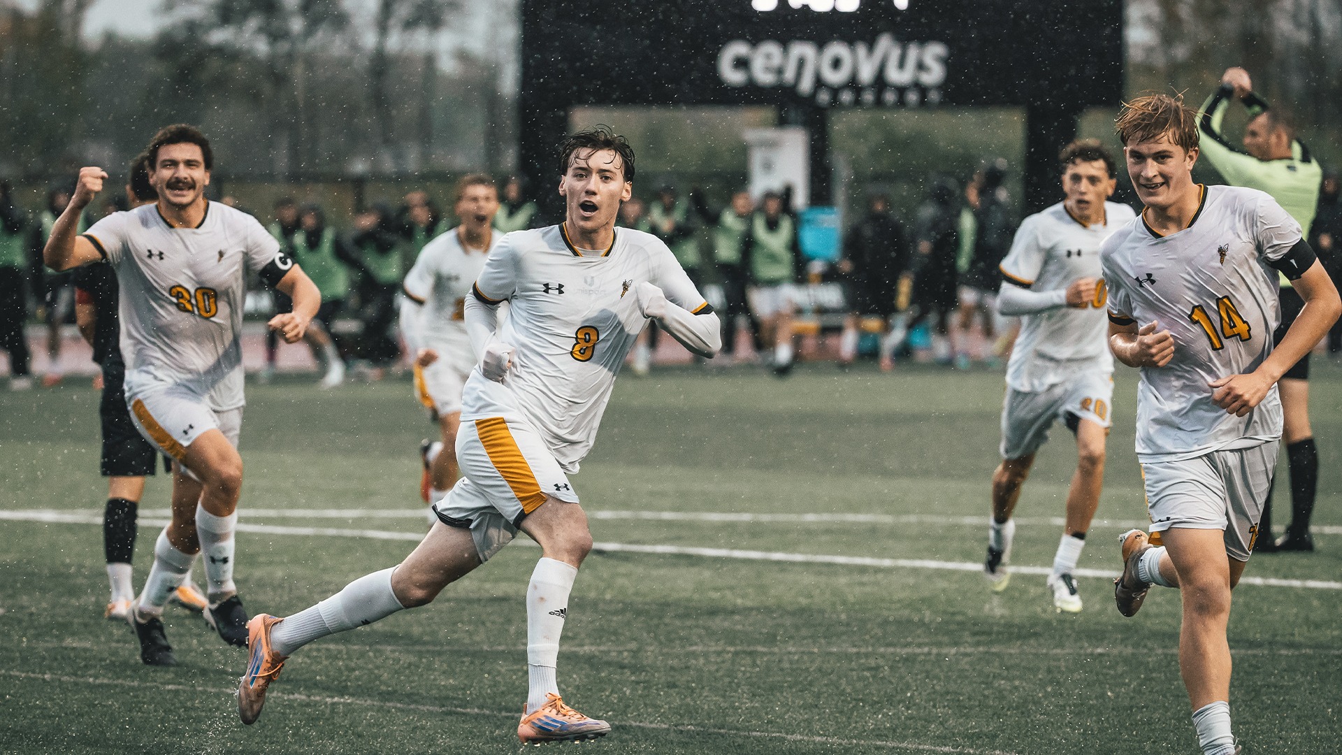 Harvey McLoughlin, Bryce Boldt and Seth Davidson celebrating a goal.