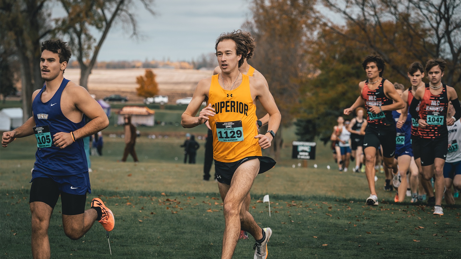 Ben Plackner mid-stride on the cross country course.