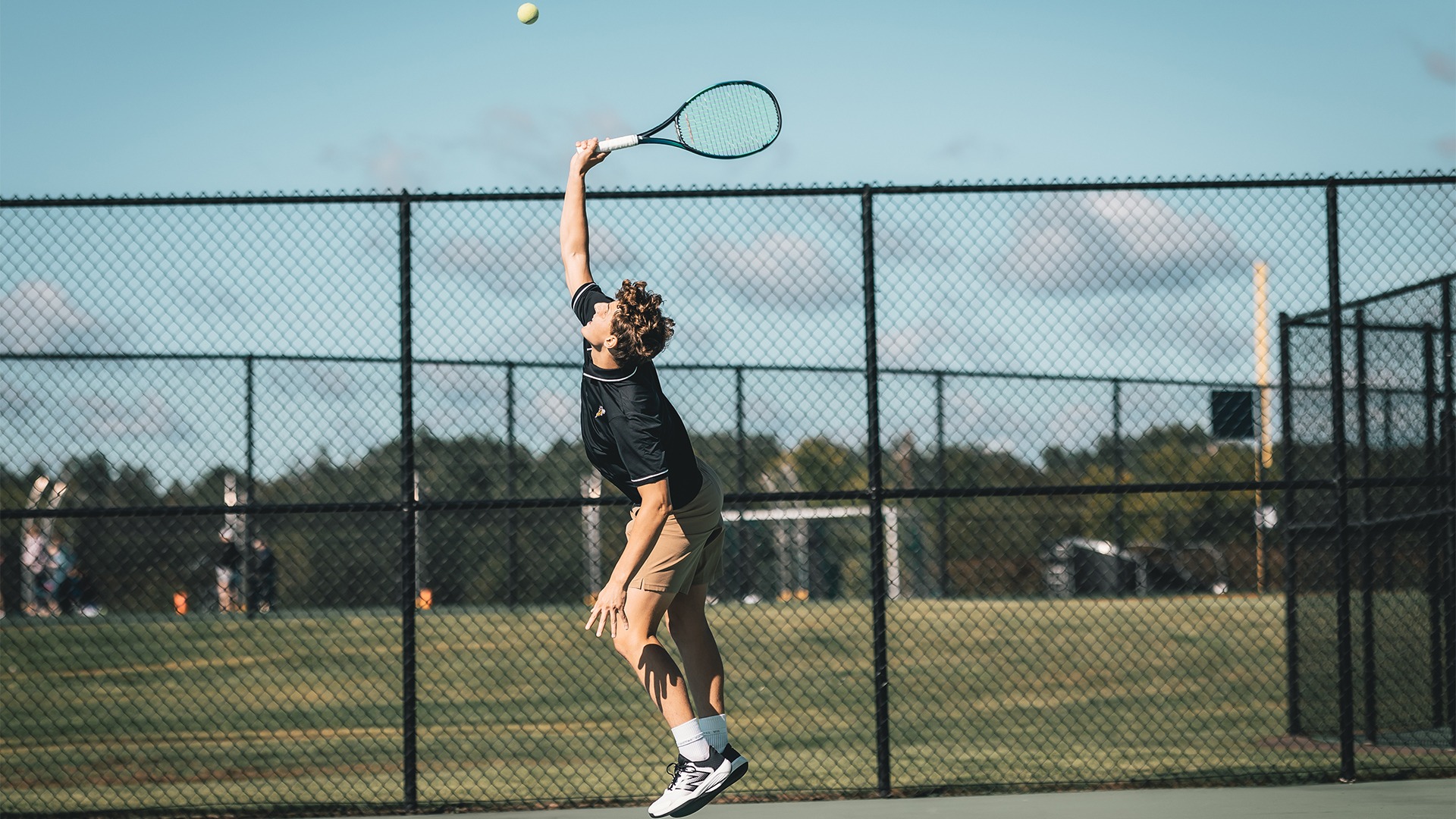 Andrei Rivera right before connecting with his serve.