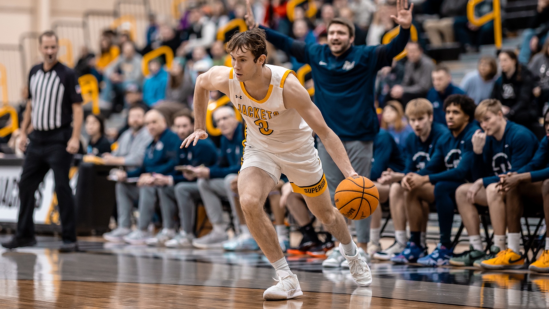Andrew Beers drives towards the hoop. 
