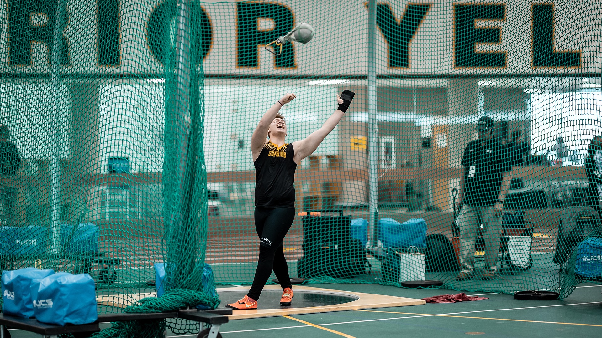 Carson Wilhorn releasing his weight throw.