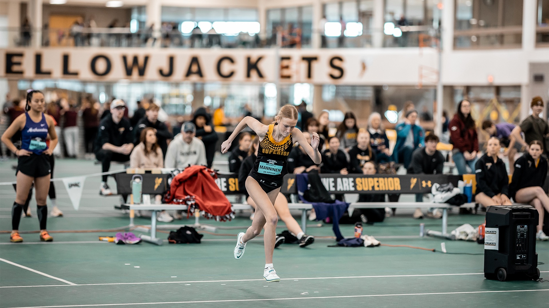 KelliJoy Manninen in the high jump.