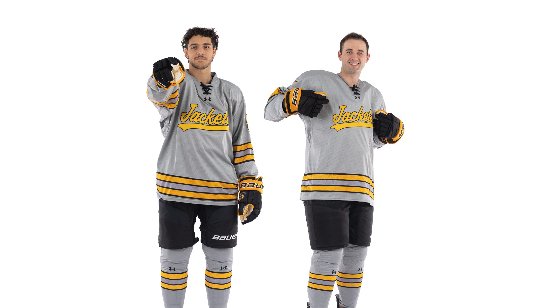 Daniel Rozsival and Tyler Ryder posing.