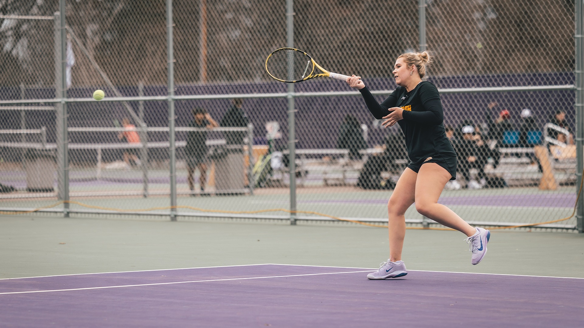 Addison Fee after a forehand shot.