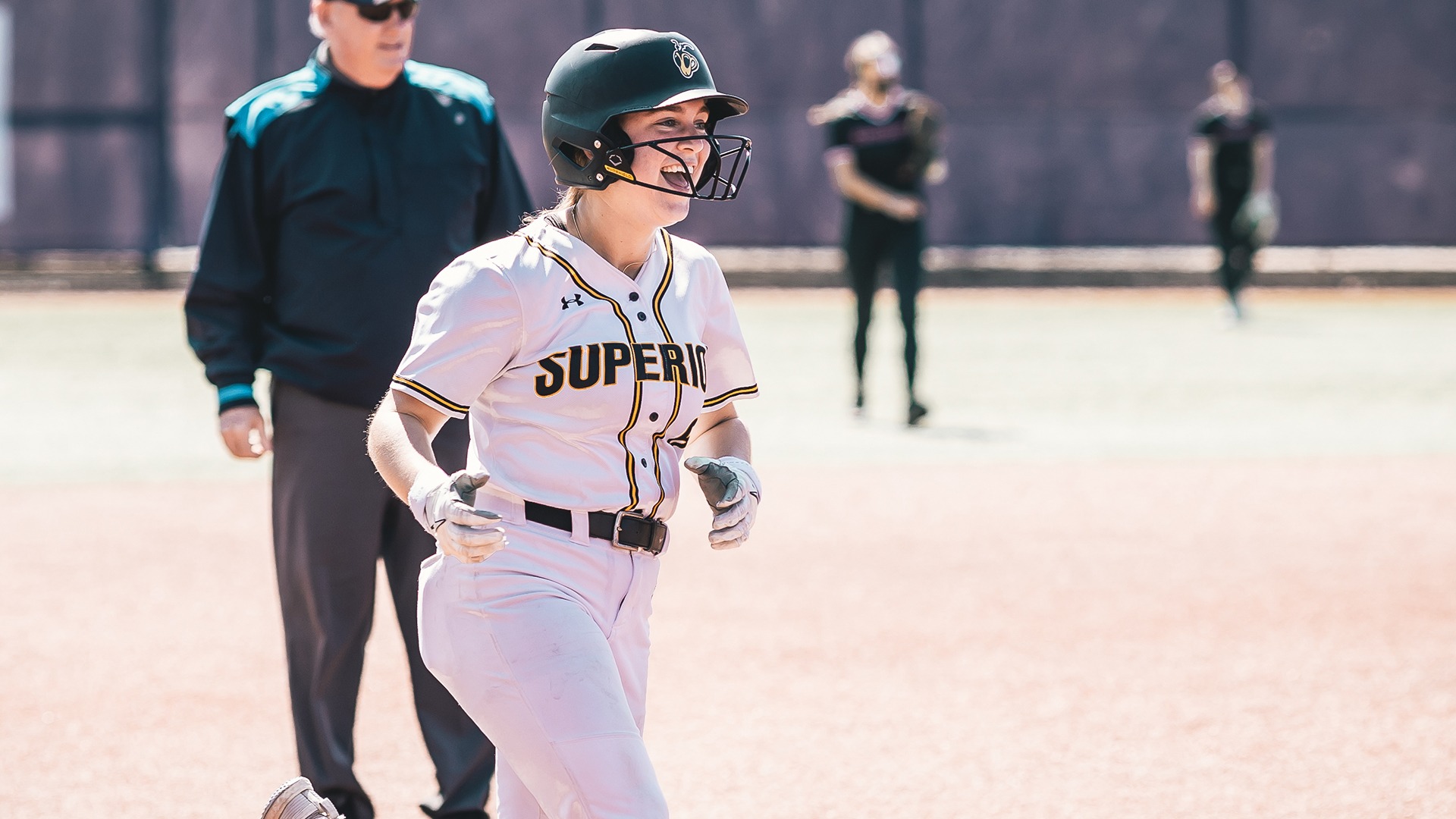 Delaney Johnson rounding the bases after a home run. 
