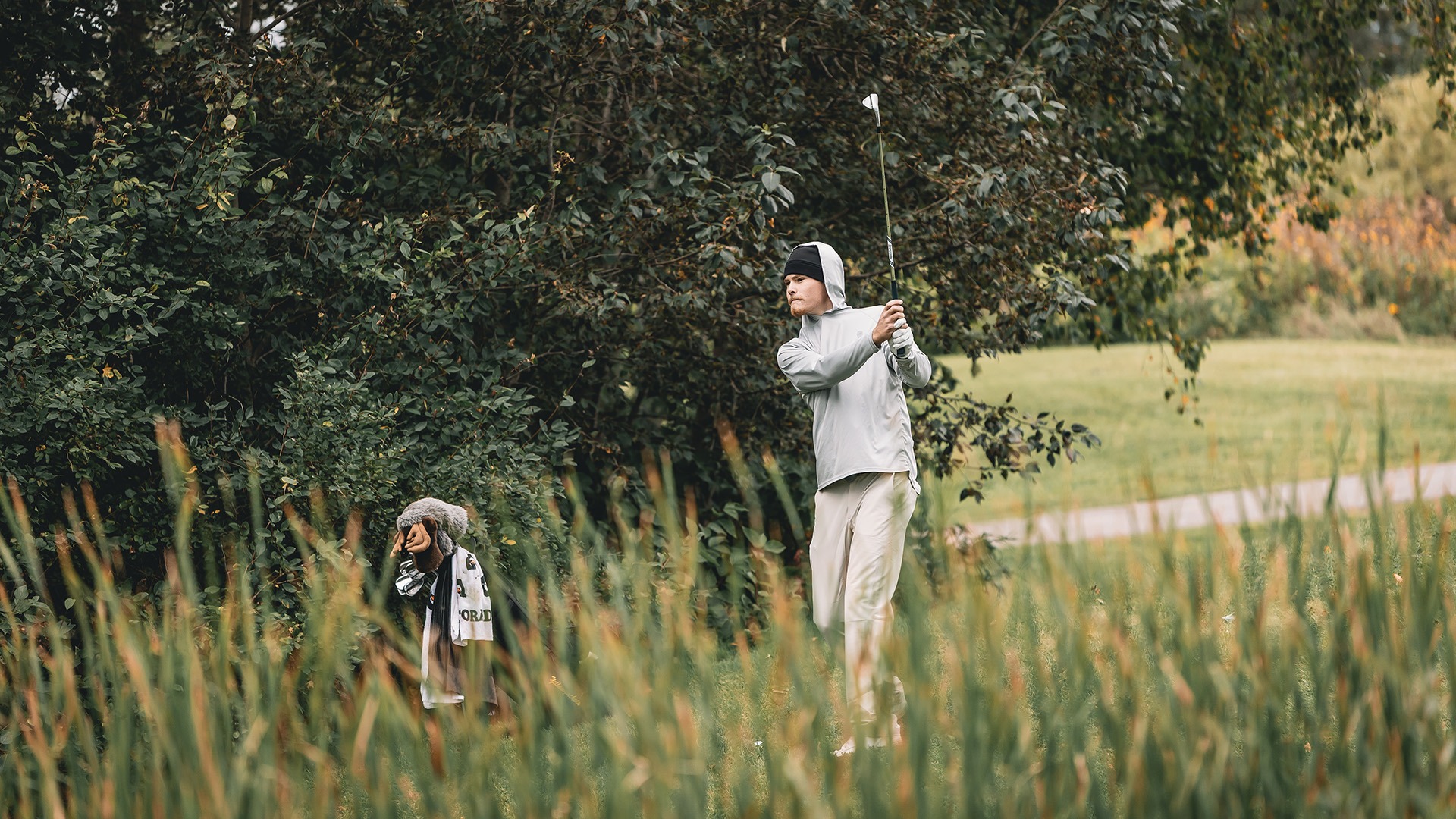 Caden Knutson finishing his swing. 