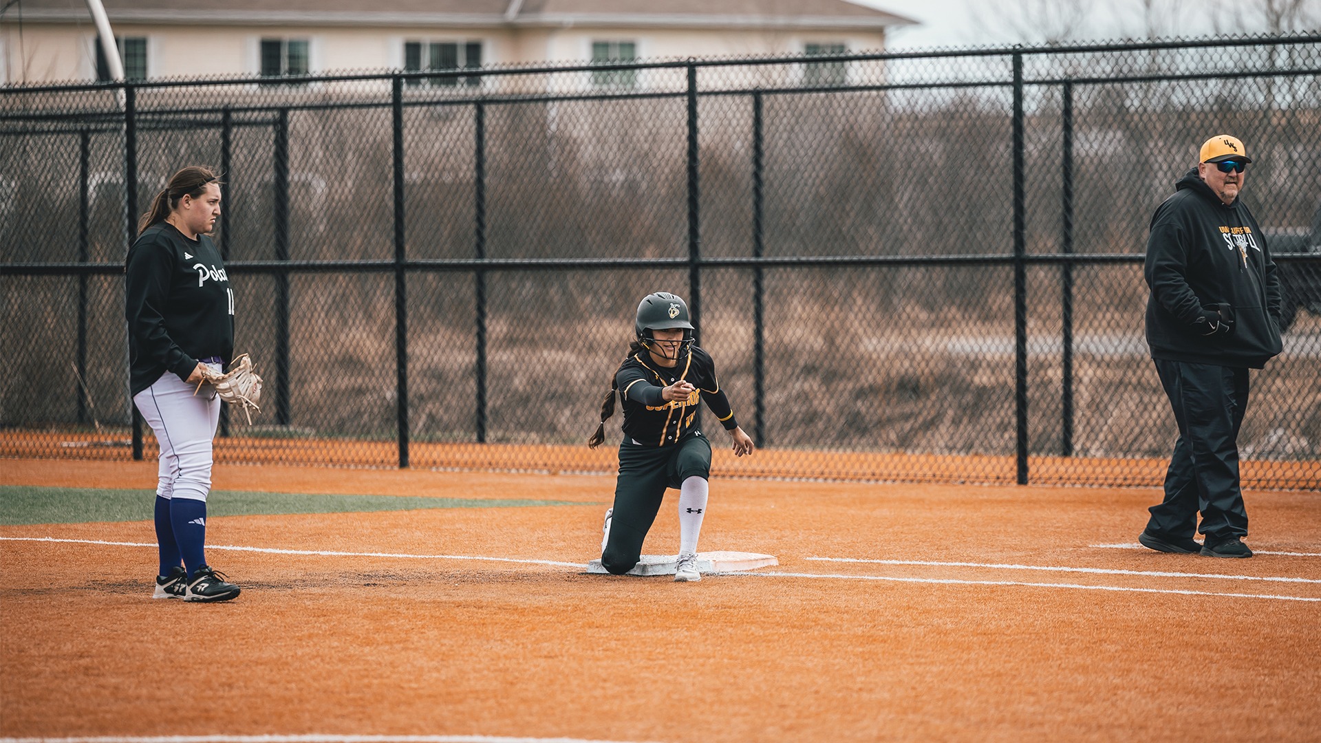 Larissa Synder celebrating to her dugout.