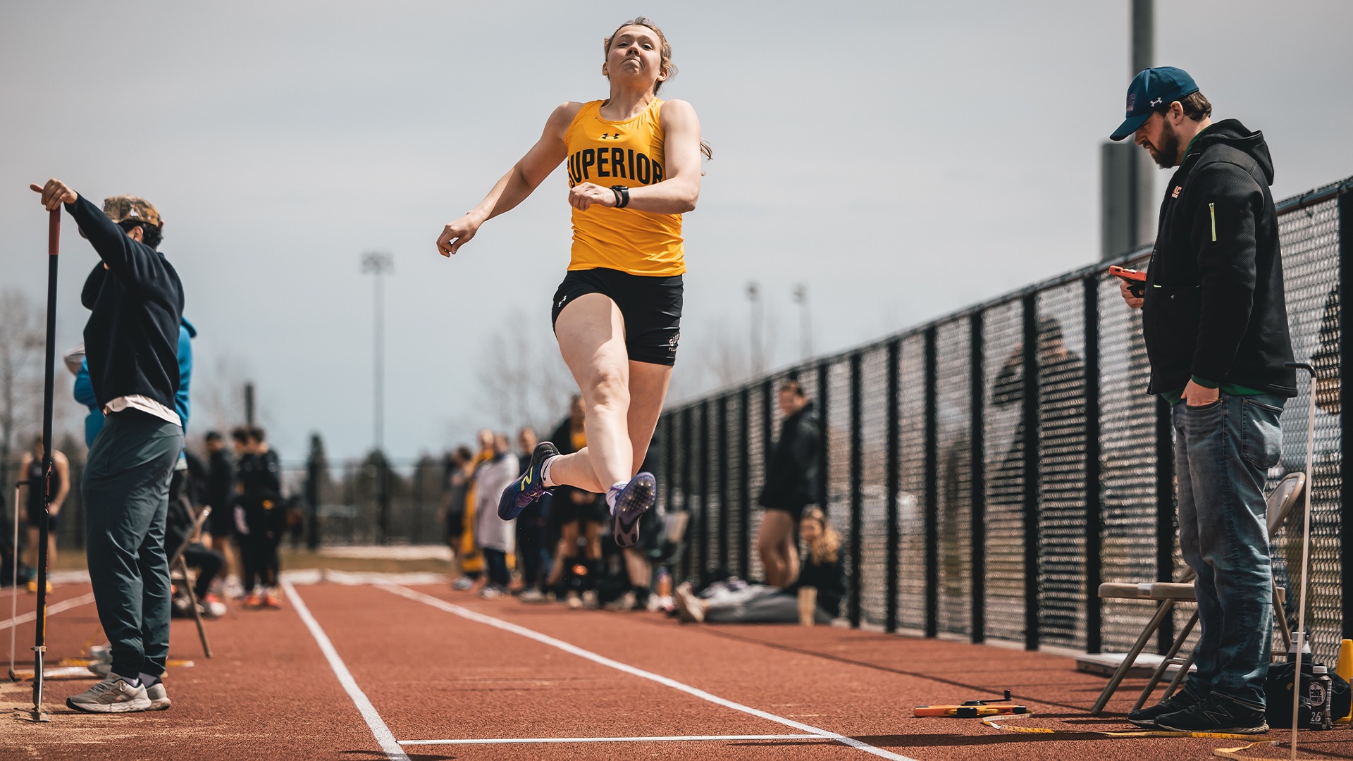 Maddie Reott mid-jump.