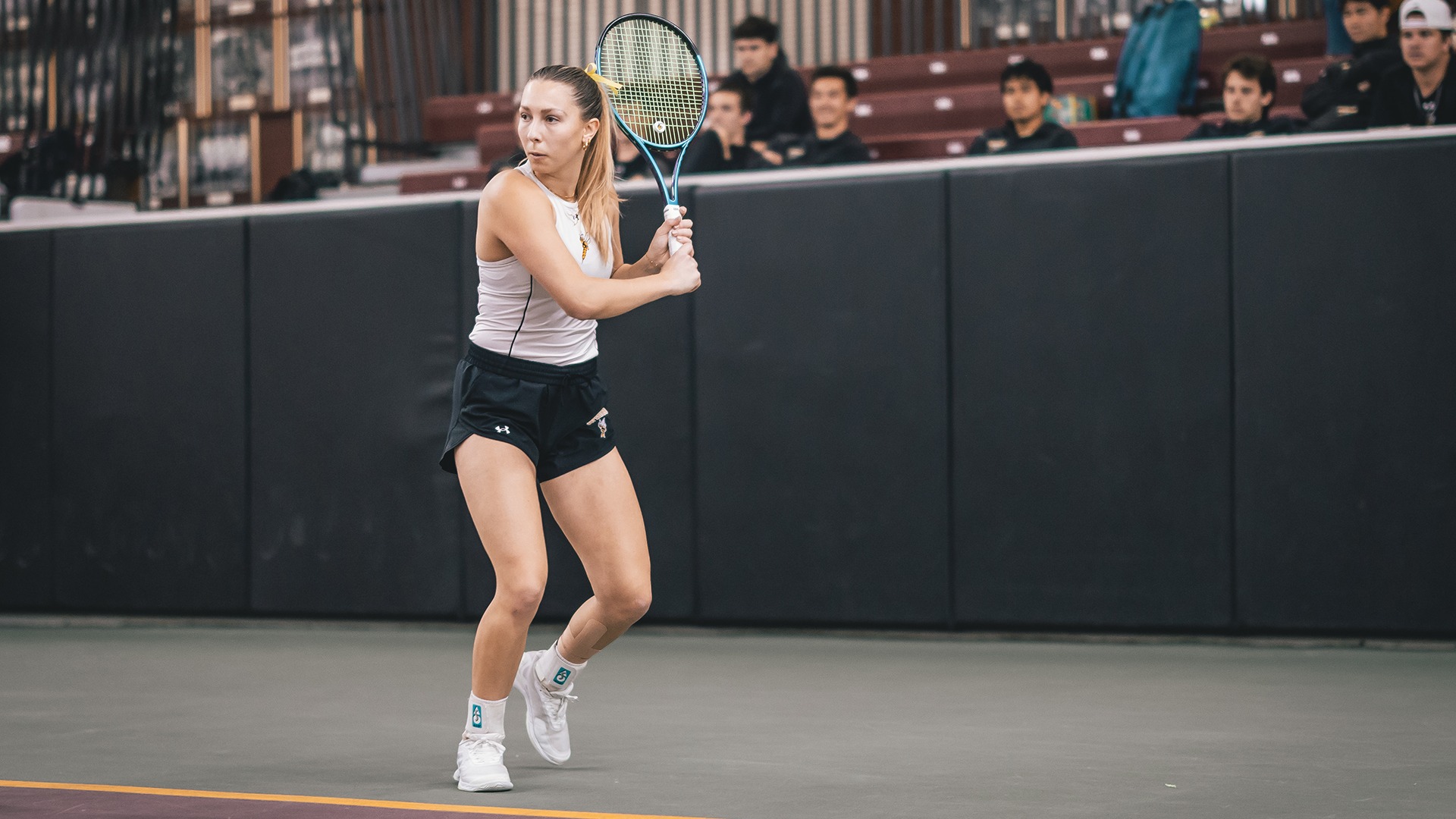 Anouk Bluemm looks to return a ball. 