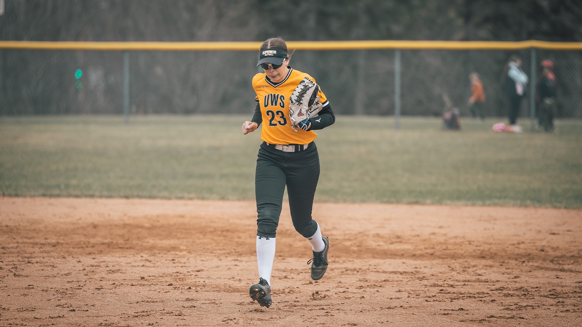 MyKenzie Leccia running off the field.
