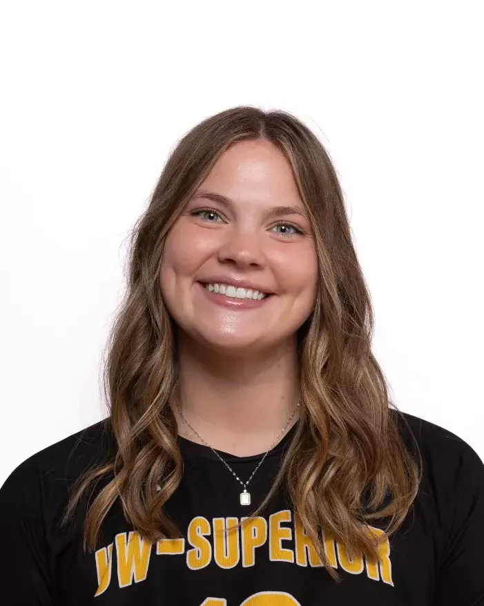 Headshot of a woman in a black jersey