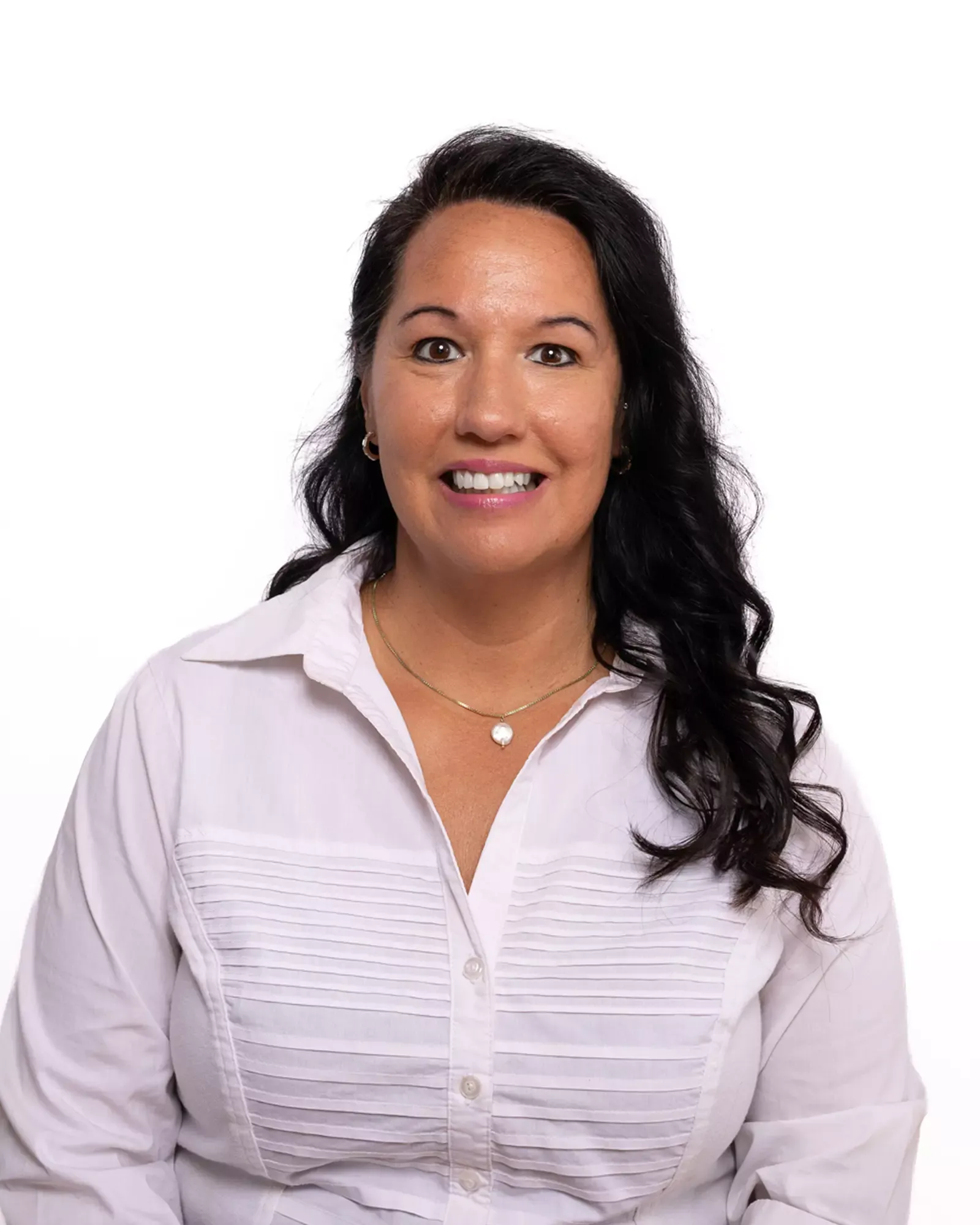 Headshot of a woman in a white shirt