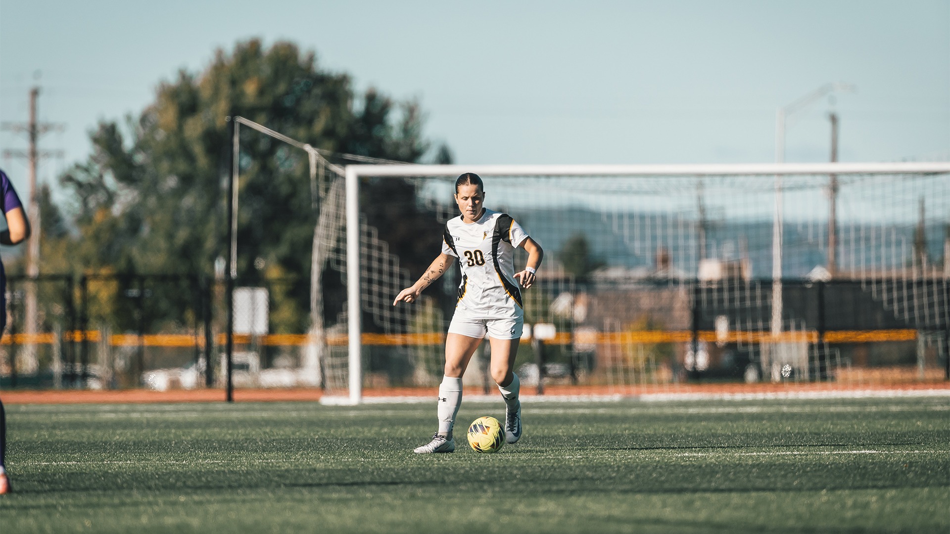 Claire Loria with possession of the ball.