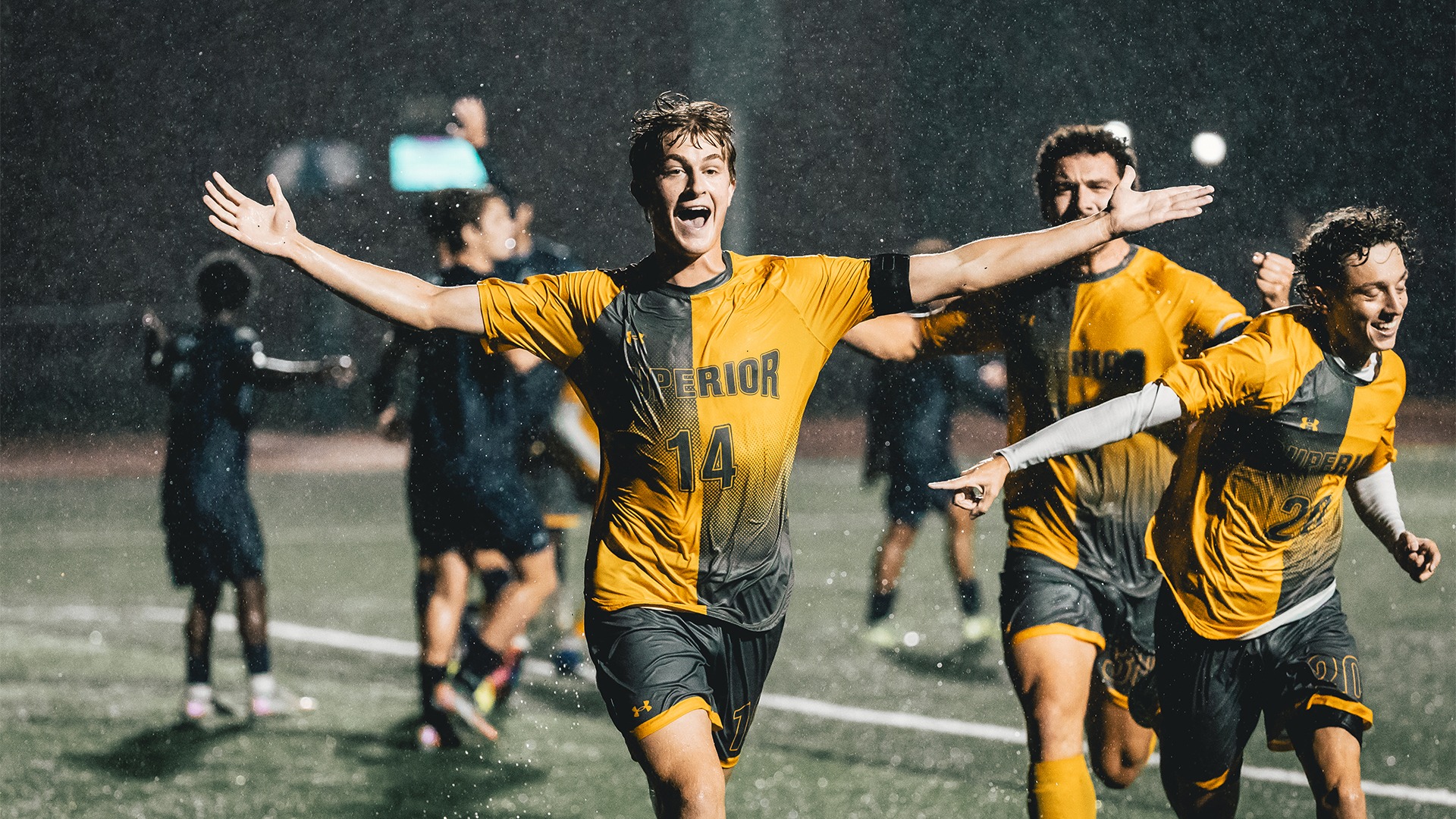 Seth Davidson celebrating a goal with his hands outwards.