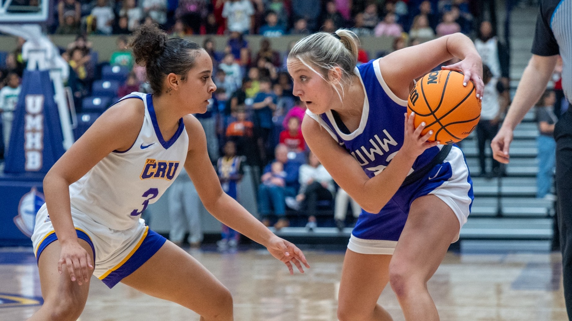 Cam Nies looks inside against UMHB