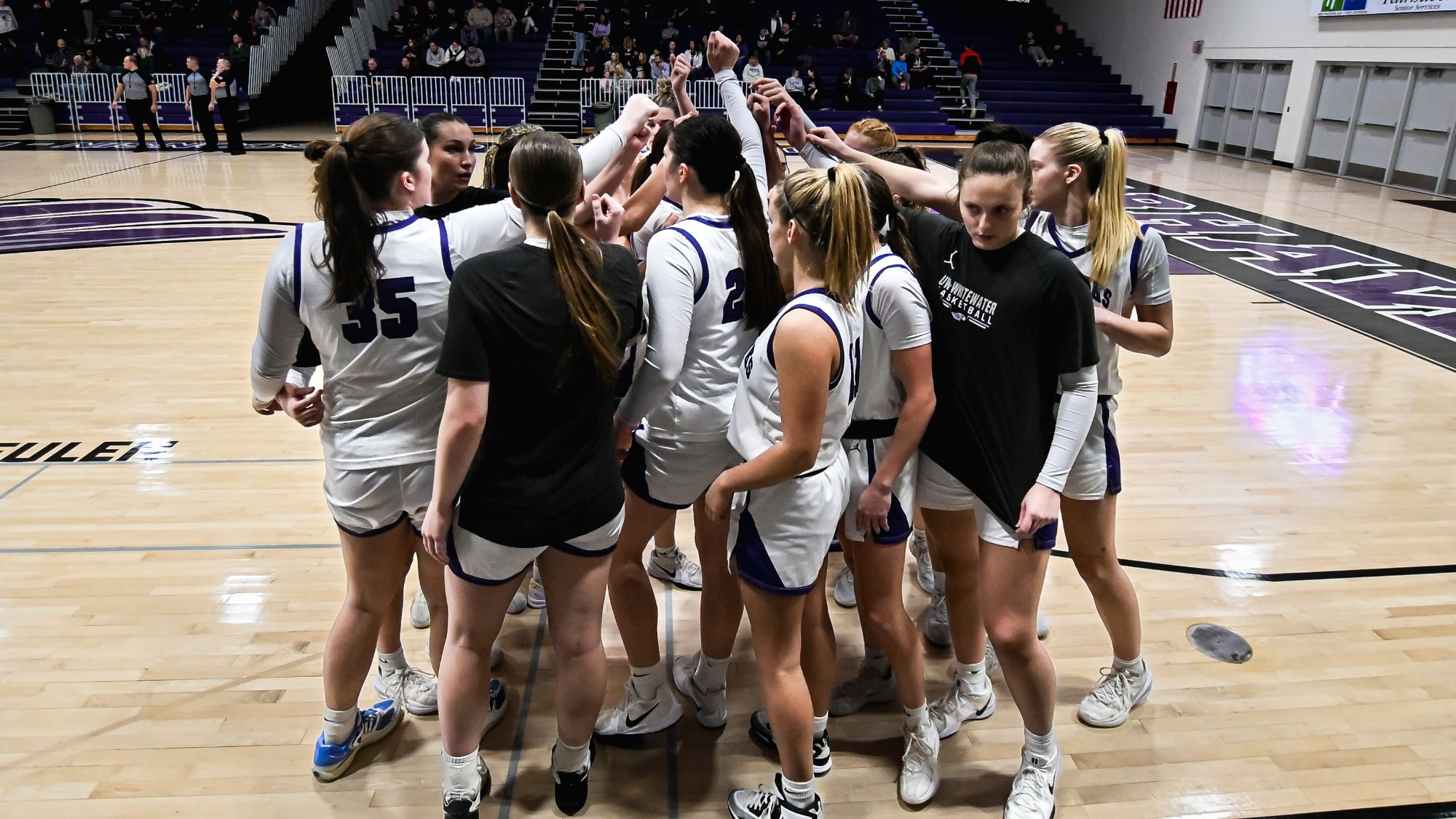 Women's basketball team huddle