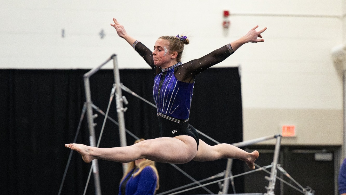 Danielle Dudziak does a split jump on the floor