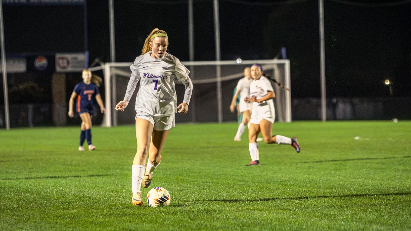 Simkowski Dribbles ball up field