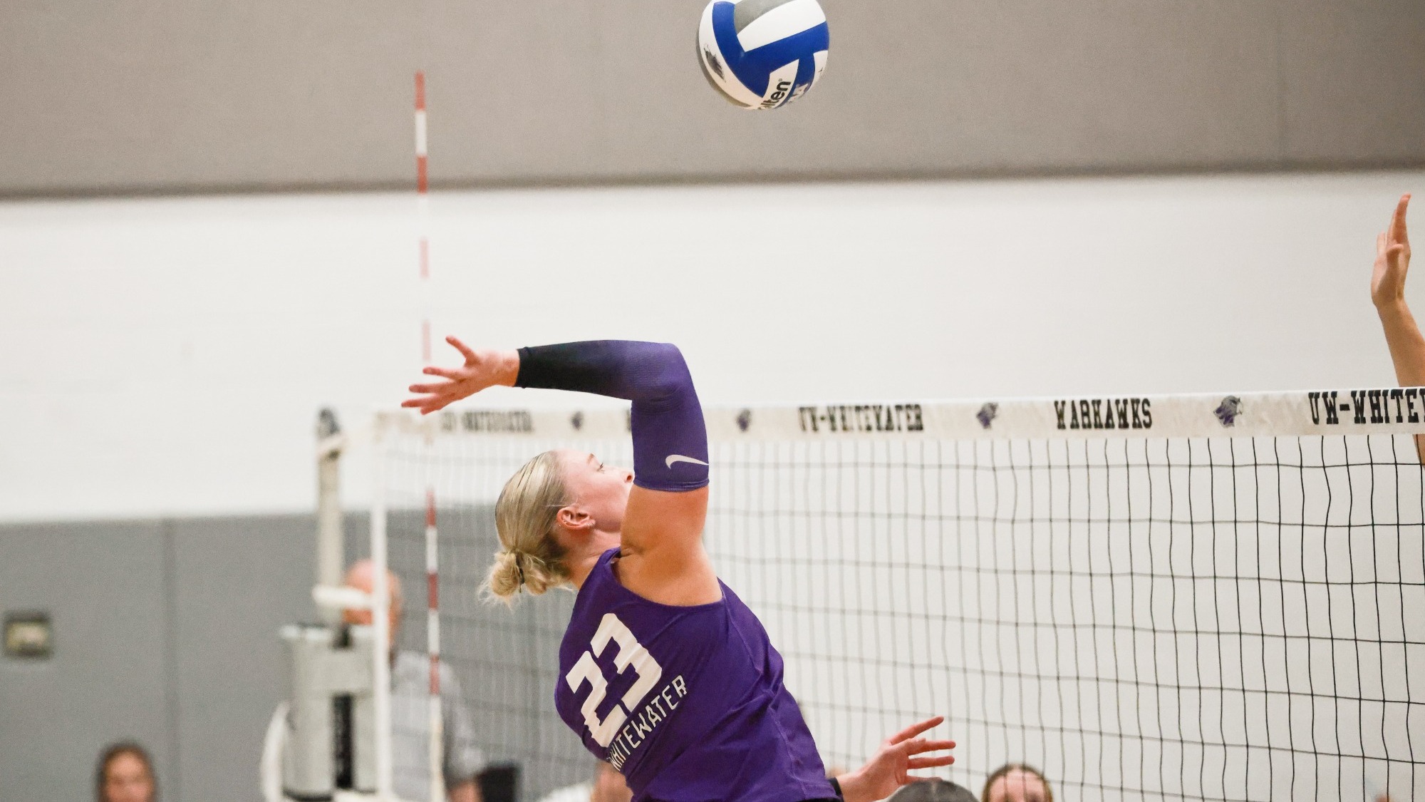 Abbie Dix attacks a ball during a match