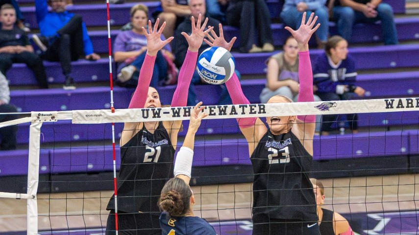 Abbie Dix and Aubrie Krzus block